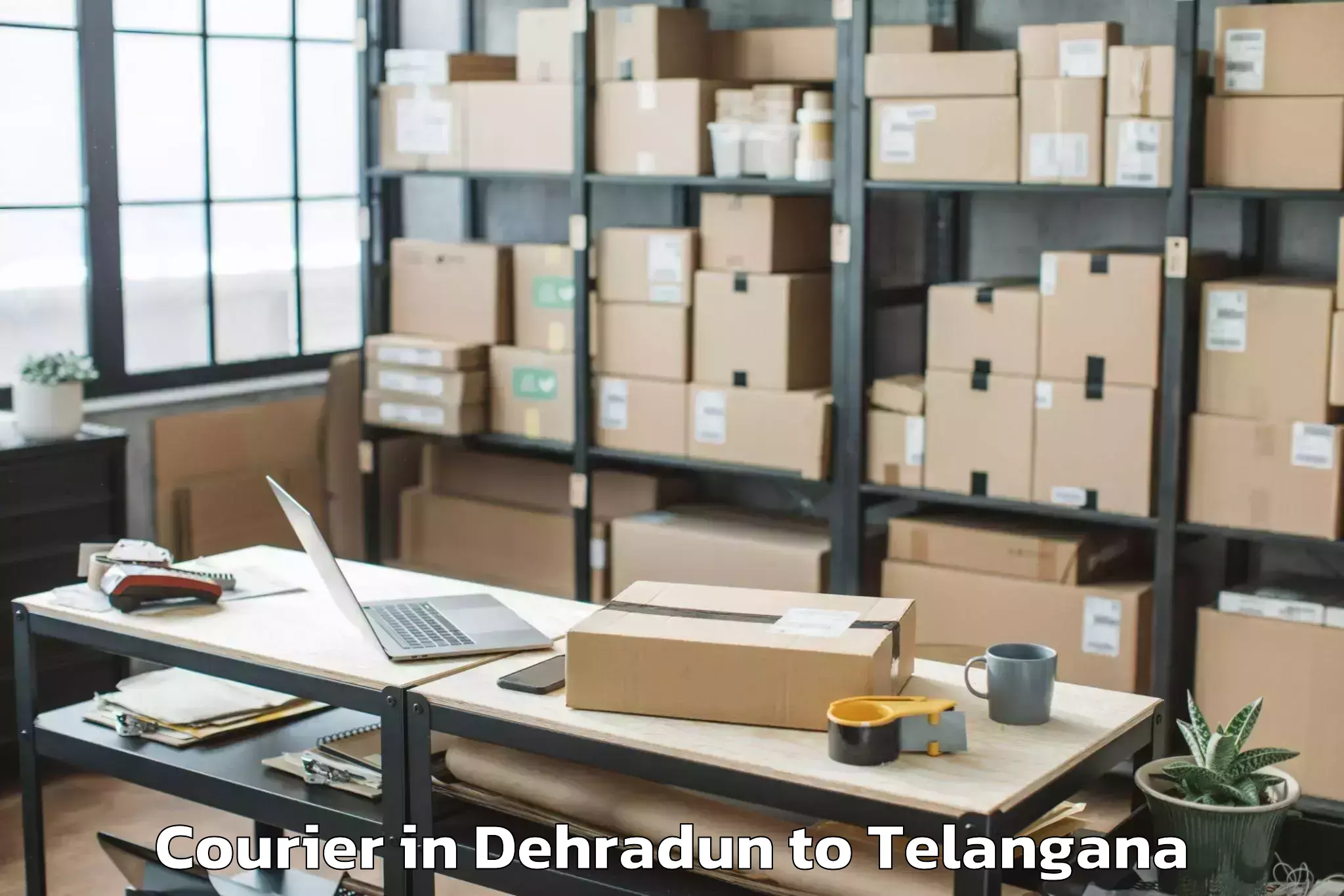 Quality Dehradun to Mutharam Manthani Courier